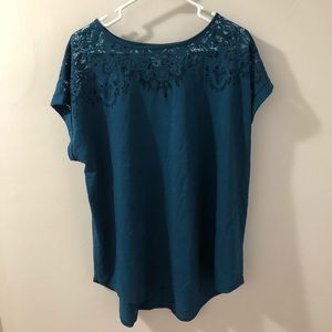 Teal top with laser floral pattern on top